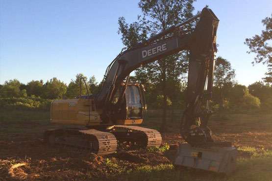 land clearing equipment John Deere 200 DLC Excavator